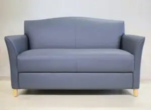 A couch with a blue cover on it