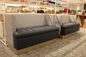 A room with two benches and a table